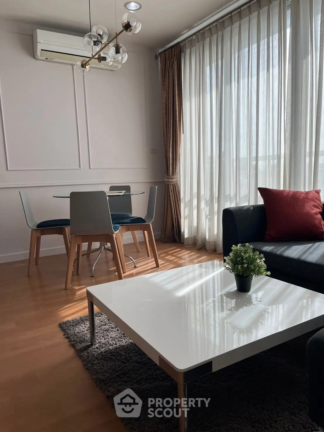 Stylish living room with modern furniture and natural light