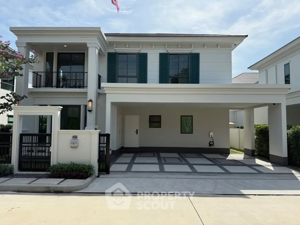 Modern two-story house with elegant facade and spacious driveway