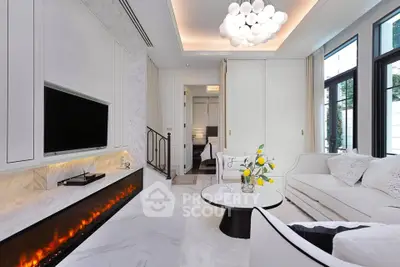 Luxurious modern living room with elegant fireplace and chic decor