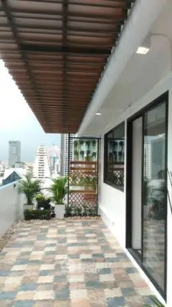 Stunning rooftop balcony with city views and modern design.