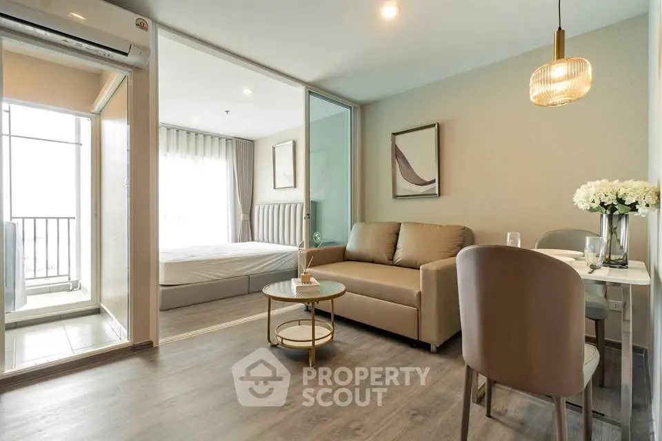 Modern apartment interior with cozy living room and elegant bedroom