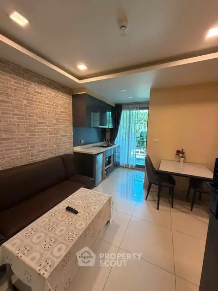 Modern living room with open kitchen and stylish decor