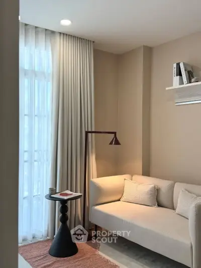 Elegant living room with modern sofa and stylish floor lamp