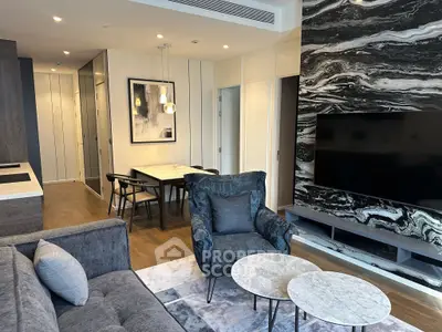 Luxurious modern living room with stylish decor and marble accents