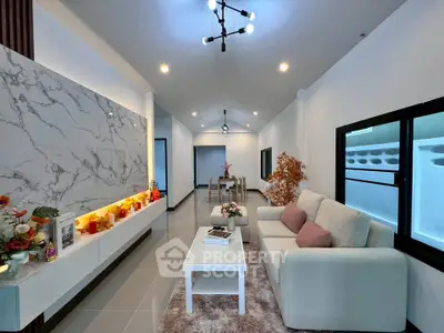 Modern living room with elegant decor and cozy seating area