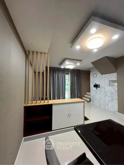 Modern living room with stylish lighting and elegant decor