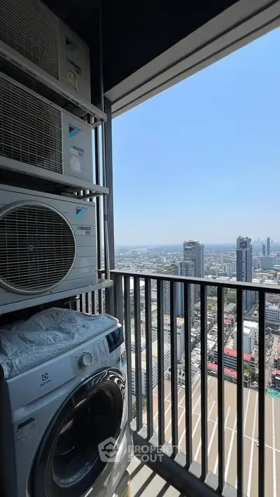High-rise balcony with city view and washing machine, perfect for urban living.