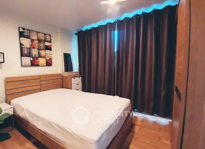 Cozy bedroom with modern decor and large window with dark curtains
