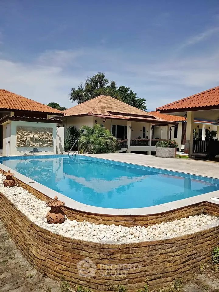 Luxurious villa with a stunning pool and elegant architecture, perfect for relaxation and entertaining.