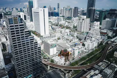 Stunning aerial view of modern cityscape with skyscrapers and urban skyline.
