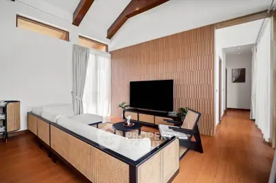 Elegant living room with modern design and wooden accents
