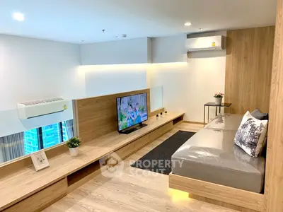 Modern living room with sleek wooden design and cozy seating area