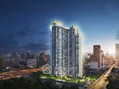 Stunning high-rise building with cityscape view at dusk, showcasing modern architecture and vibrant urban living.