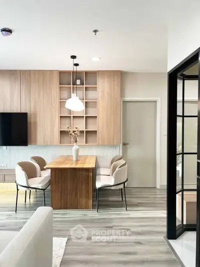 Modern dining area with wooden accents and elegant lighting in a stylish apartment.