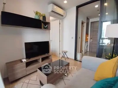Modern living room with stylish furniture and air conditioning in a cozy apartment.