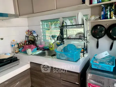 Cozy kitchen with modern appliances and ample storage space