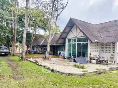 Charming rustic house with spacious garden and unique architectural design.