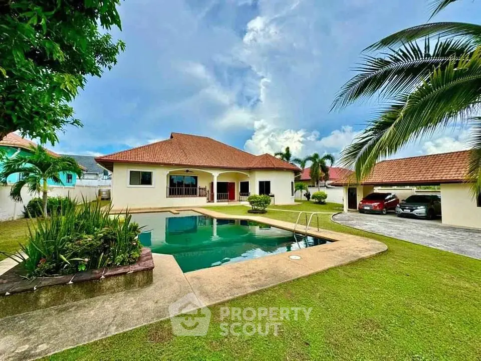 Stunning tropical villa with private pool and lush garden, perfect for luxurious living.