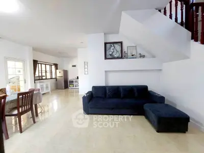 Spacious living room with modern decor and open layout