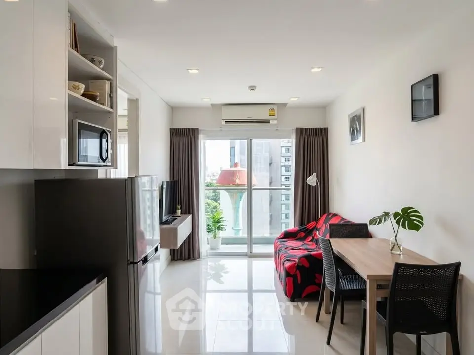Modern living room with balcony view in stylish apartment