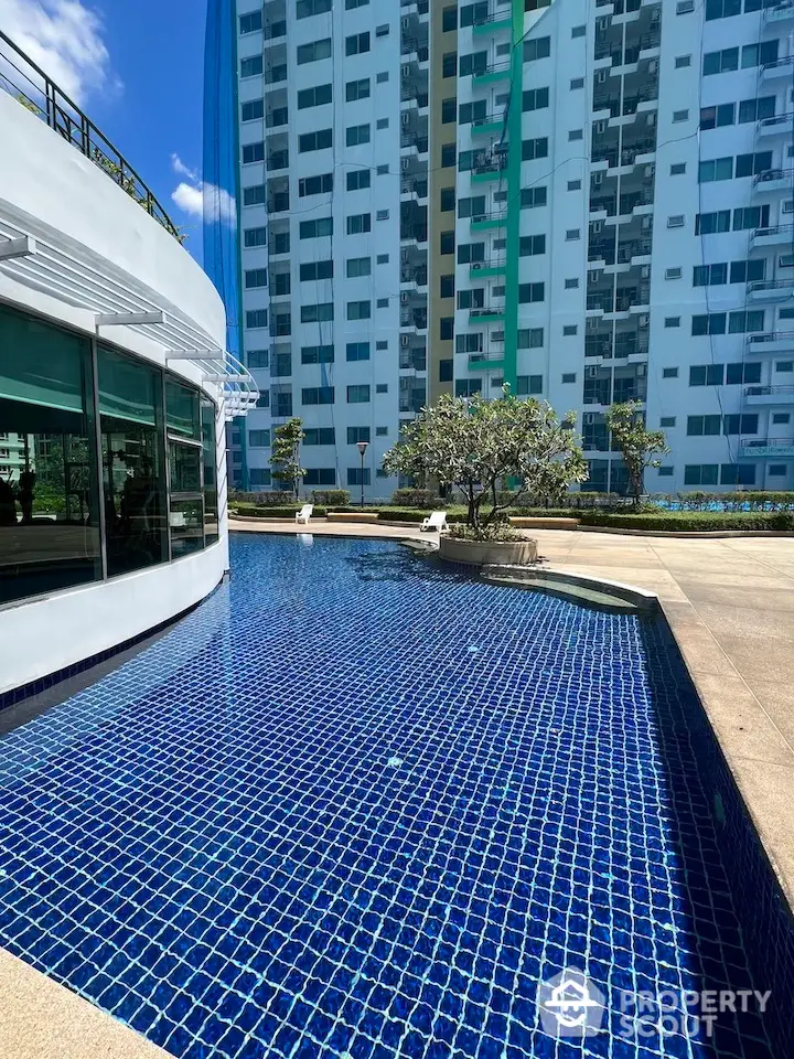 Luxurious condominium with stunning pool and modern architecture