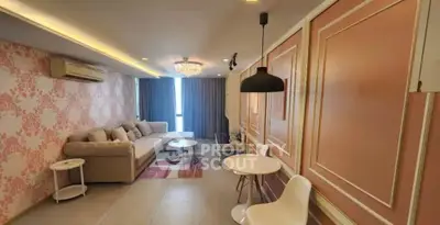 Luxurious living room with elegant decor and spacious seating area