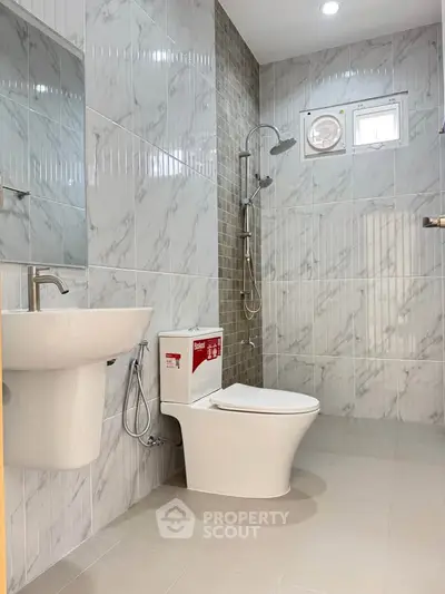 Modern bathroom with sleek fixtures and elegant tile design