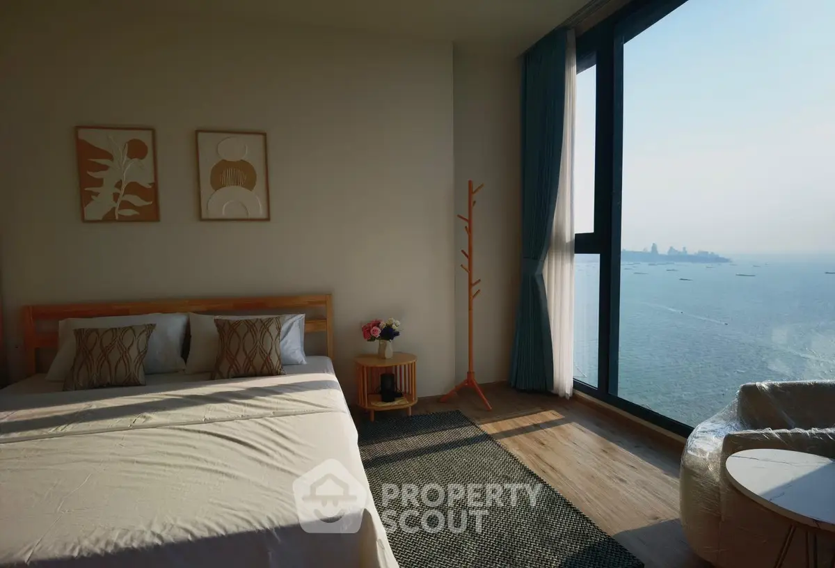 Luxurious bedroom with stunning ocean view and modern decor