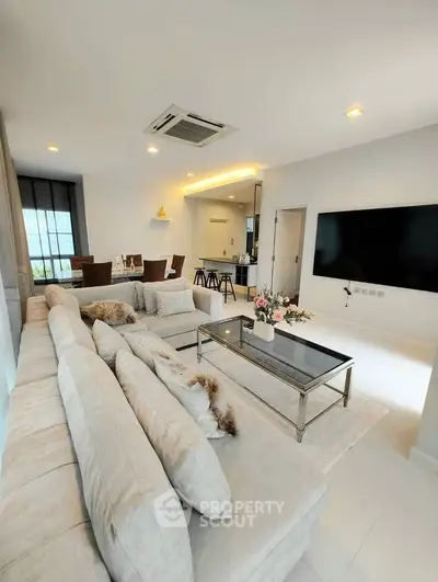 Luxurious modern living room with plush sofa and sleek decor