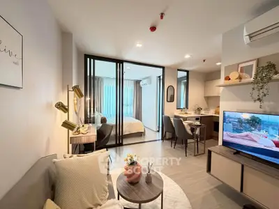 Modern open-plan living room with stylish decor and cozy ambiance