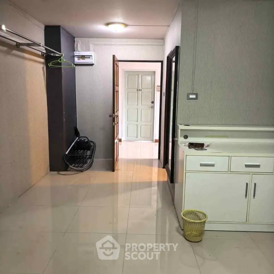 Spacious interior hallway with modern finishes and ample storage space