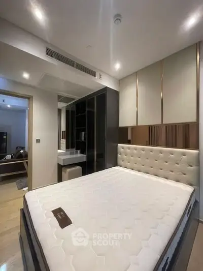 Modern bedroom with stylish decor and spacious layout