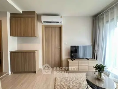 Modern living room with air conditioning and stylish wooden furniture