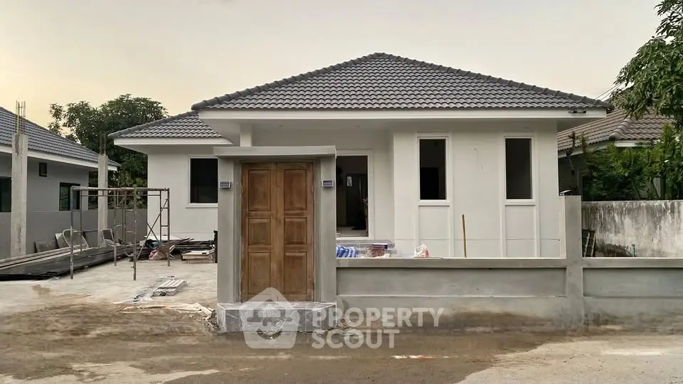 Charming single-story home with modern design and spacious front yard