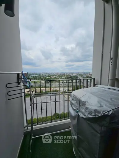 Stunning balcony view with lush greenery and expansive skyline, perfect for relaxation and enjoying nature.
