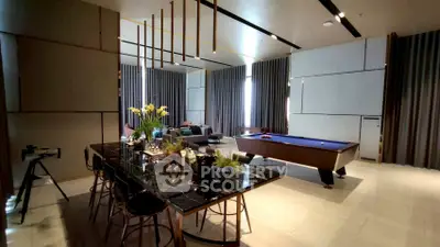 Luxurious modern living room with pool table and elegant decor