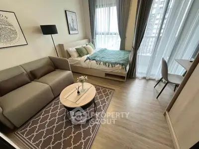 Modern studio apartment with cozy living area and stylish decor