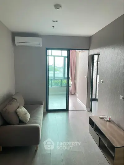 Modern living room with balcony view in stylish apartment