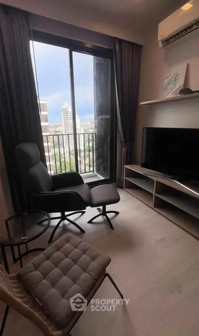 Modern living room with city view, stylish furniture, and large window balcony access.