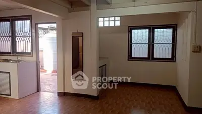 Spacious interior with tiled flooring and large windows, ideal for customization.