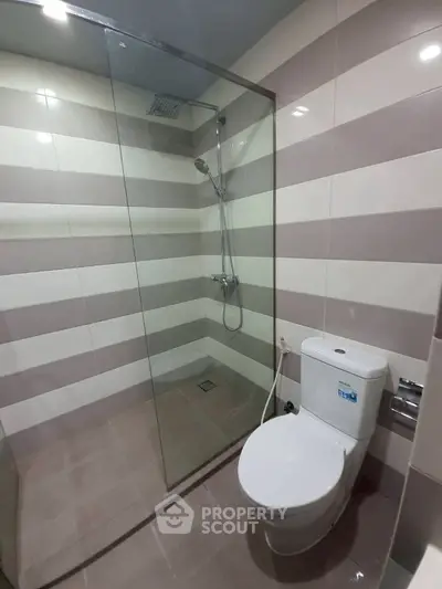 Modern bathroom with glass shower and sleek design