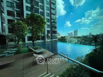 Luxurious condominium with stunning infinity pool and city skyline view