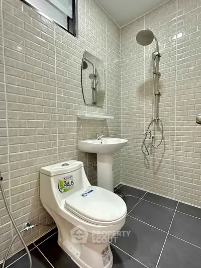 Modern bathroom with sleek fixtures and stylish tile design