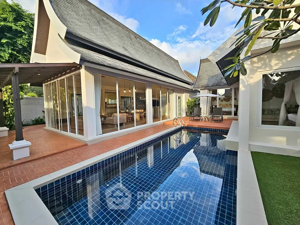 Luxurious villa with private pool and modern architecture in tropical setting