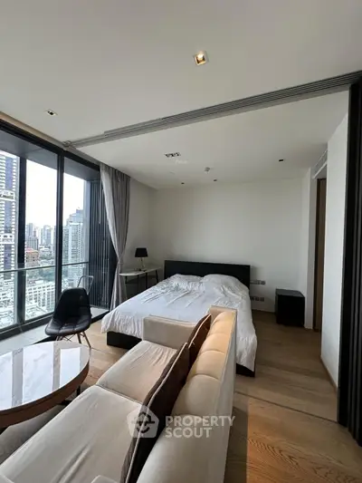 Luxurious bedroom with stunning city view and modern furnishings