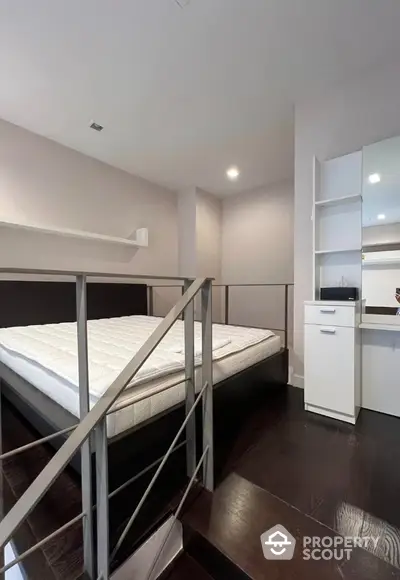 Modern bedroom with sleek design and built-in storage solutions