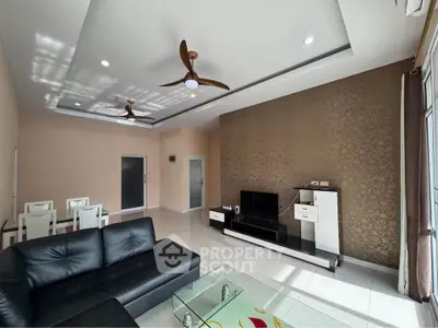 Spacious modern living room with elegant decor and ceiling fans