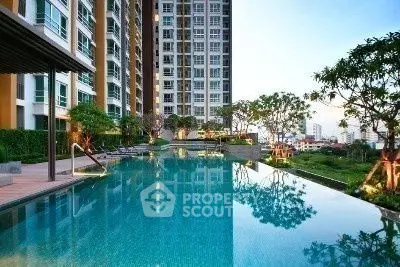 Luxurious high-rise apartment with stunning pool and garden view