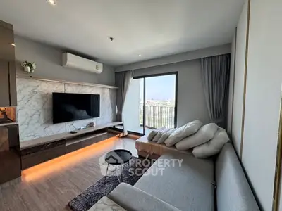 Modern living room with sleek design and balcony view