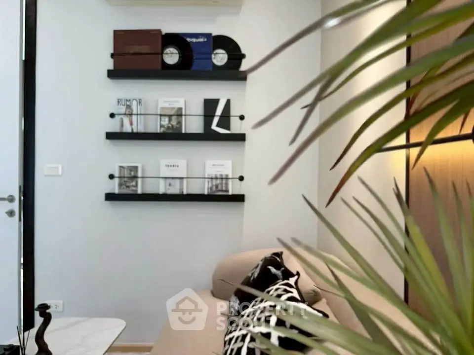 Stylish living room with modern decor and wall-mounted shelves